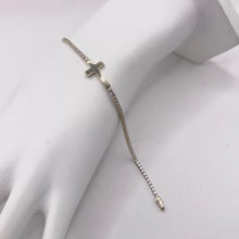 PULSERA TIPO TENNIS CON CRUZ TRANSVERSAL - ORO 10K