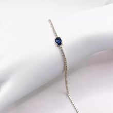 PULSERA TIPO TENNIS CON ZIRCONIA OVAL CENTRAL AZUL - ORO 10K