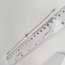 PULSERA TIPO TENNIS CON CRUZ TRANSVERSAL - ORO 10K