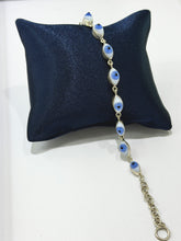 PULSERA OJO FORMA NATURAL BLANCO-AZUL - PLATA .925