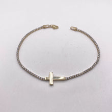 PULSERA TIPO TENNIS CON CRUZ TRANSVERSAL - ORO 10K