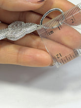 DIJE DE CRUZ CURVA CON ZIRCONIA - PLATA .925