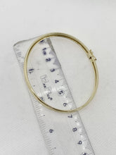 ARO OVALADO - LISO - 6.8 cm x 6 mm - ORO 10K