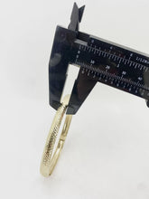 ARO OVALADO - GRABADO DIAMANTADO - 6.8 cm x 6 mm - ORO 10K