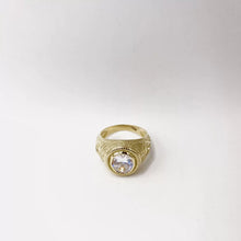 ANILLO ZIRCONIA OVAL CON MARGEN SOGA - ORO 10K