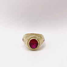 ANILLO ZIRCONIA OVAL GUINDA CON MARGEN SOGA - ORO 10K