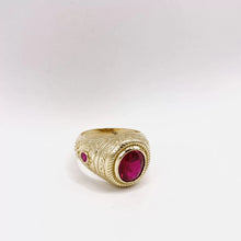 ANILLO ZIRCONIA OVAL GUINDA CON MARGEN SOGA - ORO 10K