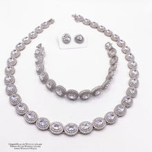 SET JUEGO OVAL ZIRCONIA CENTRAL CON CONTORNO - PLATA .925