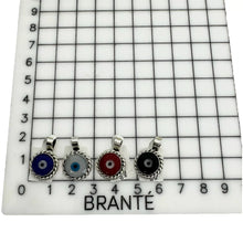 CADENA CON DIJE OJO MARGEN SOGA