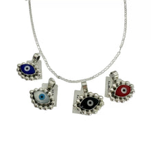 CADENA CON DIJE OJO FORMA CON MARGEN BOLEADO