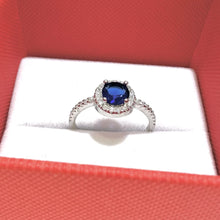 ANILLO CIRCULO ZIRCONIA AZUL CON LATERALES - PLATA .925