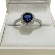ANILLO CIRCULO ZIRCONIA AZUL CON LATERALES - PLATA .925