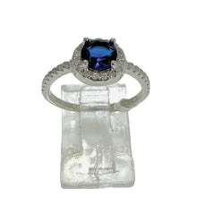 ANILLO CIRCULO ZIRCONIA AZUL CON LATERALES - PLATA .925