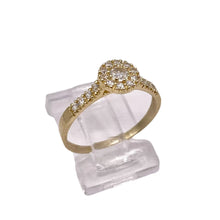 ANILLO ZIRCONIA CENTRAL CON CONTORNO MULTIZIRCONIAS  - ORO 10K