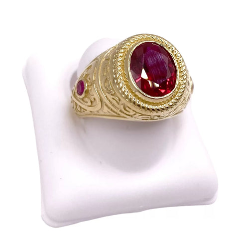 ANILLO ZIRCONIA OVAL GUINDA CON MARGEN SOGA - ORO 10K