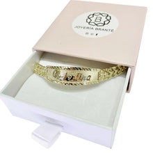 LETRAS RESALTADAS DE ORO - EN ESCLAVA DE ORO