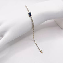 PULSERA TIPO TENNIS CON ZIRCONIA OVAL CENTRAL AZUL - ORO 10K