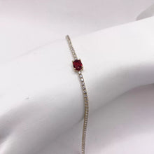 PULSERA TIPO TENNIS CON ZIRCONIA OVAL CENTRAL ROJO - ORO 10K